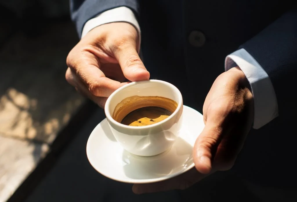 https://esg.co.il/wp-content/uploads/2019/01/a-businessman-having-coffee-PZ36CMW.webp